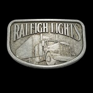 Vintage Raleigh Lights Semi Truck Belt Buckle Pewter Tone Tobacco Memorabilia